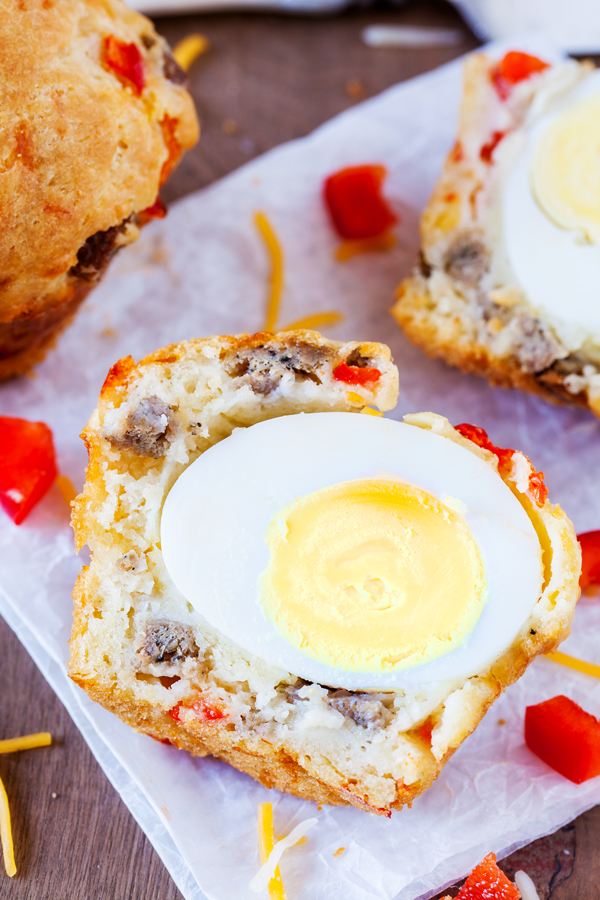 These Breakfast Sausage & Egg Muffins come with a surprise boiled egg inside and can be made ahead so you have breakfast at the ready for the entire week!