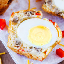 These Breakfast Sausage & Egg Muffins come with a surprise boiled egg inside and can be made ahead so you have breakfast at the ready for the entire week!