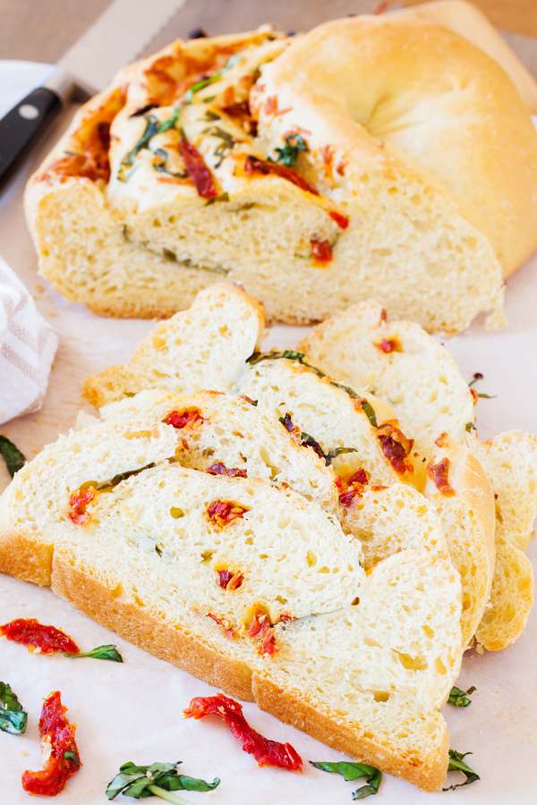 Great for bread baking beginners, this Pane Bianco (Italian for White Bread) is filled with sun-dried tomatoes, garlic, fresh basil, and mozzarella cheese, that will sure to impress.