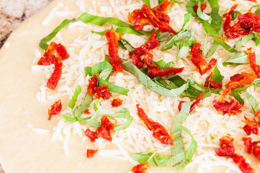 Great for bread baking beginners, this Pane Bianco (Italian for White Bread) is filled with sun-dried tomatoes, garlic, fresh basil, and mozzarella cheese, that will sure to impress.