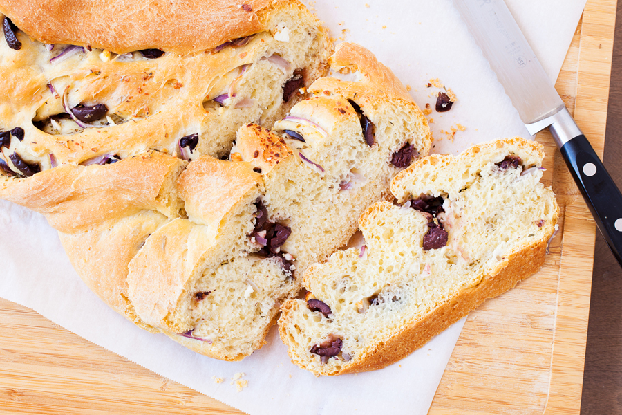 Olives, feta, and red onions add a slight twist and a Mediterranean flare to the traditional Pane Bianco.