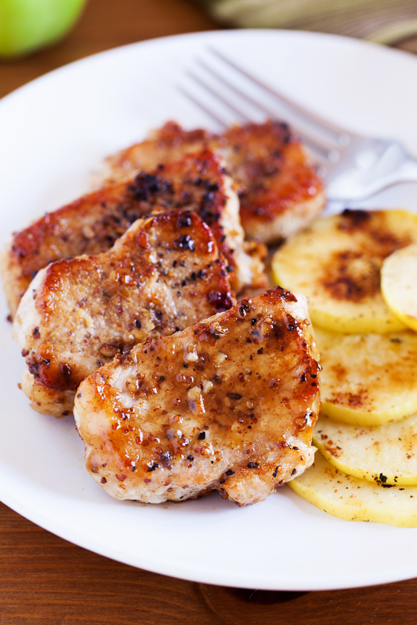 30 minute Maple Mustard Pork Loin is served with tender apple nutmeg rings and is the perfect dish for your Fall dinner table.