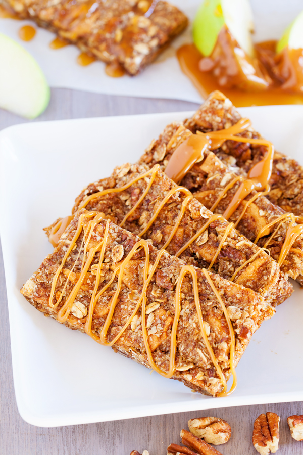 Full of crunchy pecans, chewy apples, and a caramel ribbon, these Caramel Apple Pie Snack Bars are the next best thing to an apple pie without the fuss of the crust.