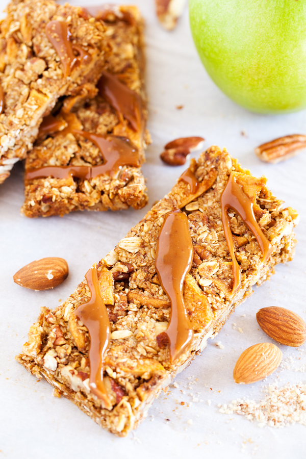 Full of crunchy pecans, chewy apples, and a caramel ribbon, these Caramel Apple Pie Snack Bars are the next best thing to an apple pie without the fuss of the crust.