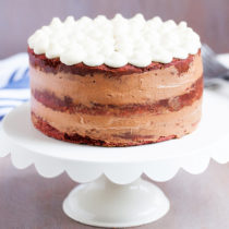 A to-die-for combination, this Red Velvet Espresso Cake has three delicious layers of red velvet cake, filled with fluffy espresso cream in between, and topped with sweet and tangy cream cheese frosting!