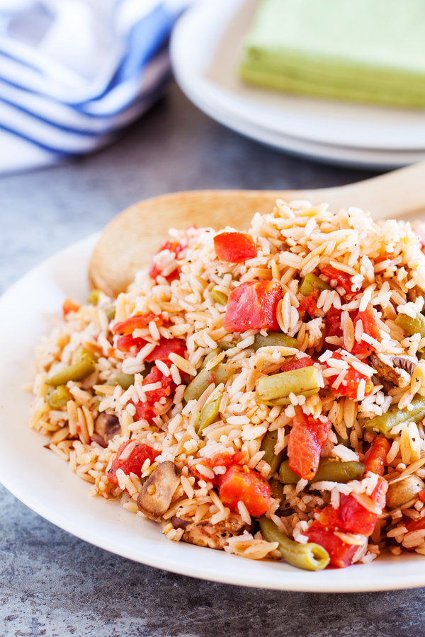 Taking its cue from the traditional green bean casserole, this Green Bean Rice Pilaf is the lightened-up, made over version and adds a festive touch to any Friendsgiving table.