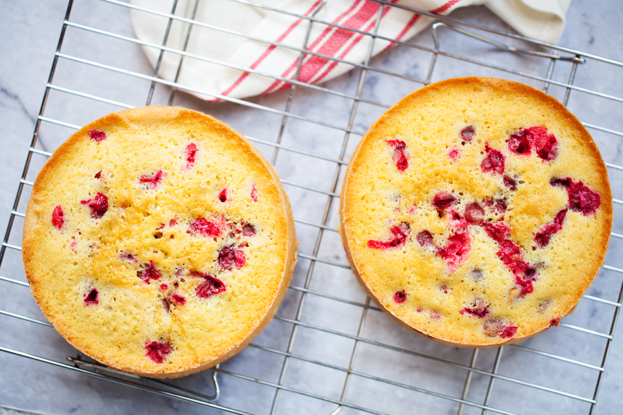 Infused with orange flavor and studded with juicy cranberries, this Orange Cranberry Cake is the perfect festive dessert for your Thanksgiving and holiday tables.