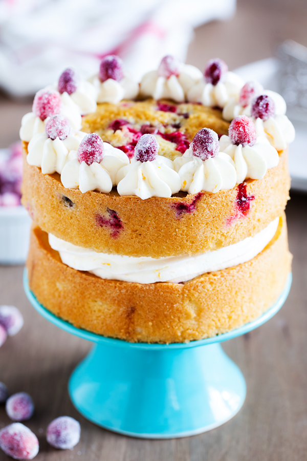 Infused with orange flavor and studded with juicy cranberries, this Orange Cranberry Cake is the perfect festive dessert for your Thanksgiving and holiday tables.