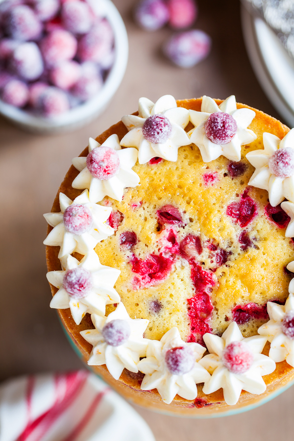 Infused with orange flavor and studded with juicy cranberries, this Orange Cranberry Cake is the perfect festive dessert for your Thanksgiving and holiday tables.