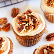 Sprinkles Brown Sugar Praline Cupcakes, directly from Candace Nelson, are incredibly moist, topped with a thick brown sugar frosting, and sprinkled with crunchy candied pecans!
