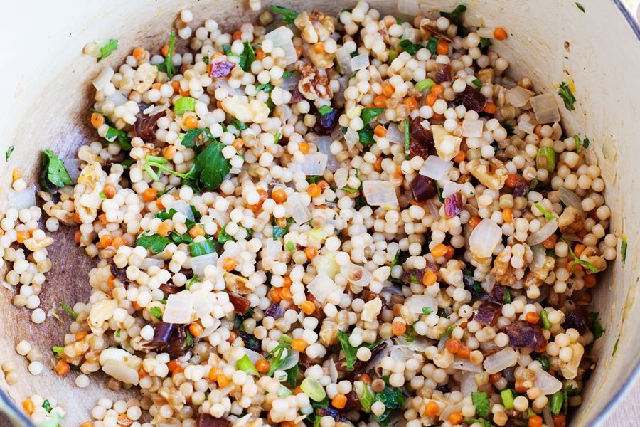 Sweet and savory Lemon Israeli Couscous with Dates and Walnuts, with just a bit of tang, makes a delicious accompaniment to your favorite entrees.