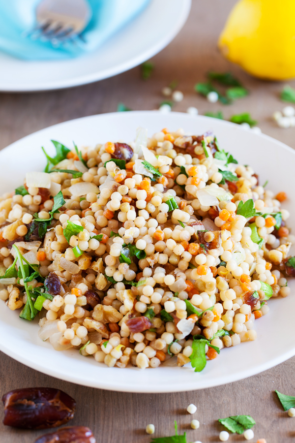 Sweet and savory Lemon Israeli Couscous with Dates and Walnuts, with just a bit of tang, makes a delicious accompaniment to your favorite entrees.