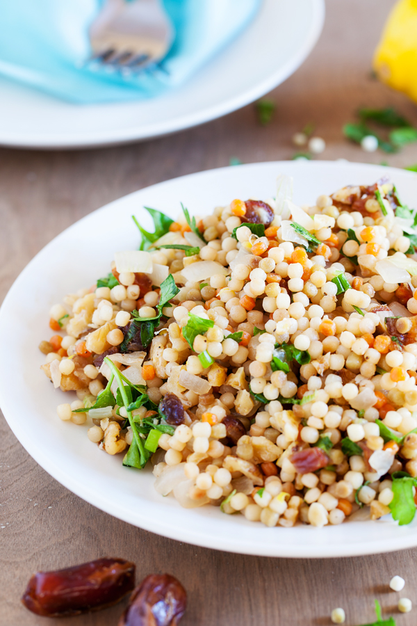 Sweet and savory Lemon Israeli Couscous with Dates and Walnuts, with just a bit of tang, makes a delicious accompaniment to your favorite entrees.