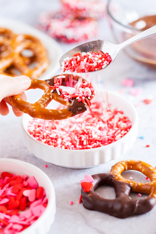 Fun, festive, and easy, these Valentine’s Day Dipped Pretzels will make everyone feel special!