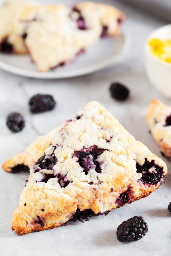 Flaky, buttery, berry-licious Blackberry Scones are packed with juicy blackberries and make the perfect snack or on-the-go breakfast.