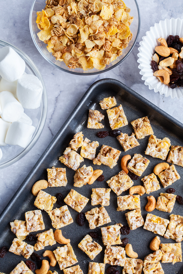 Chewy Pecan & Maple Puppy Chow with soft and chewy raisins and crunchy cashews is a fun and non-traditional way to enjoy cereal.