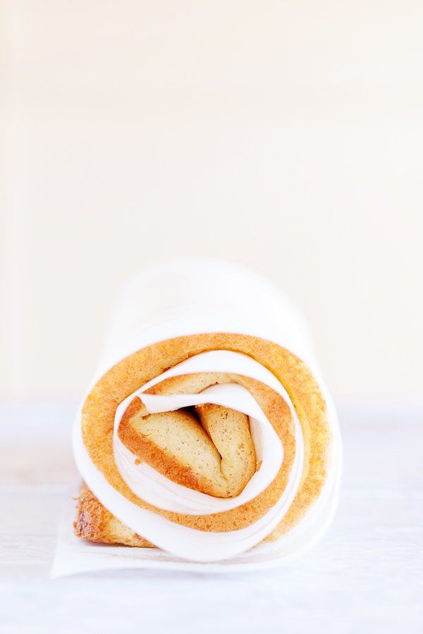 Soft and tender cake filled with lemon curd and rolled into a log makes this Lemon Jelly Roll a beautiful and impressive dessert for your guests this Easter and summer.