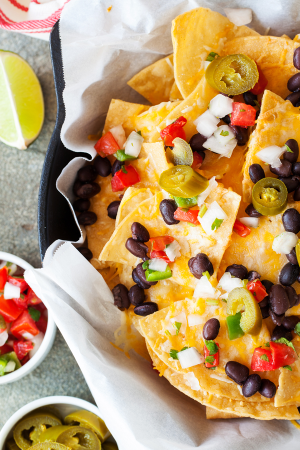 These Better than Restaurants Skillet Nachos gives you cheese in every bite and is topped with plenty of toppings.