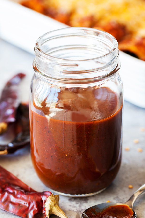A rich and thick Red Enchilada Sauce made entirely from scratch using fresh garlic and guajillo chilis.