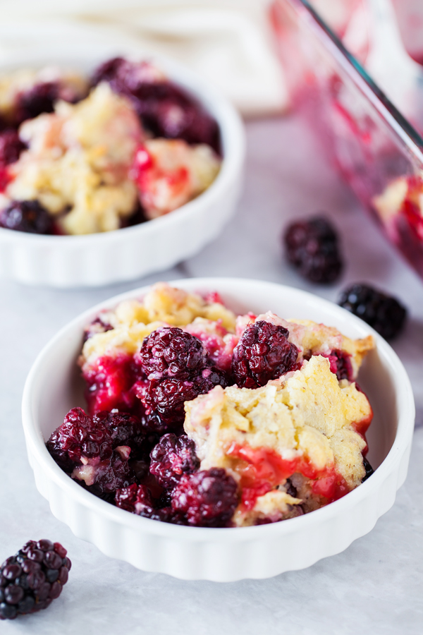 A tart and juicy blackberry filling topped with a secret-ingredient topping makes this Small Batch Blackberry Cobbler the perfect sweet treat at your next intimate gathering.