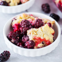 A tart and juicy blackberry filling topped with a secret-ingredient topping makes this Small Batch Blackberry Cobbler the perfect sweet treat at your next intimate gathering.
