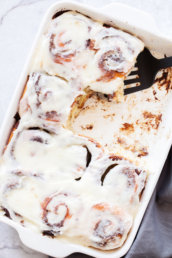 These Classic Cinnamon Rolls are filled with a cinnamon and sugar filling and topped with a sweet and tangy cream cheese glaze.