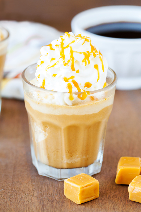 A summer-worthy treat, French Vanilla and Caramel Affogato Frappe tops homemade frappe with a scoop of no-churn caramel ice cream.