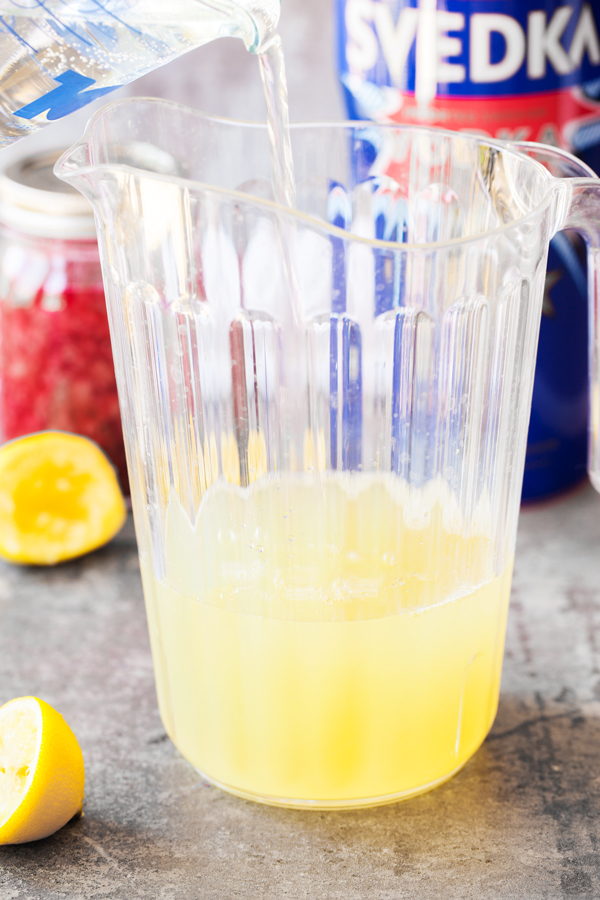 A twist on the traditional Tom Collins, this Raspberry Lemon Vodka Collins is bright, refreshing, and the perfect summer drink.