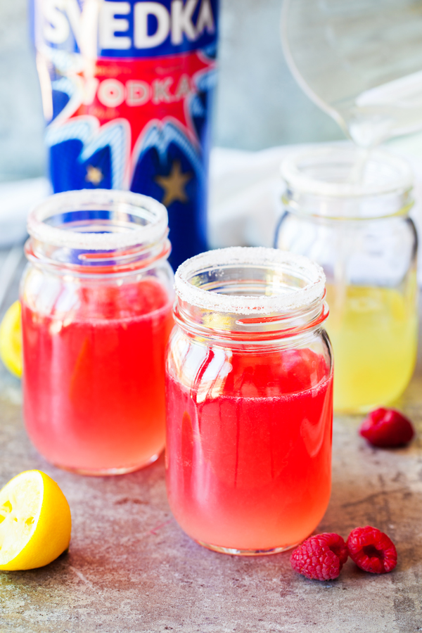 A twist on the traditional Tom Collins, this Raspberry Lemon Vodka Collins is bright, refreshing, and the perfect summer drink.