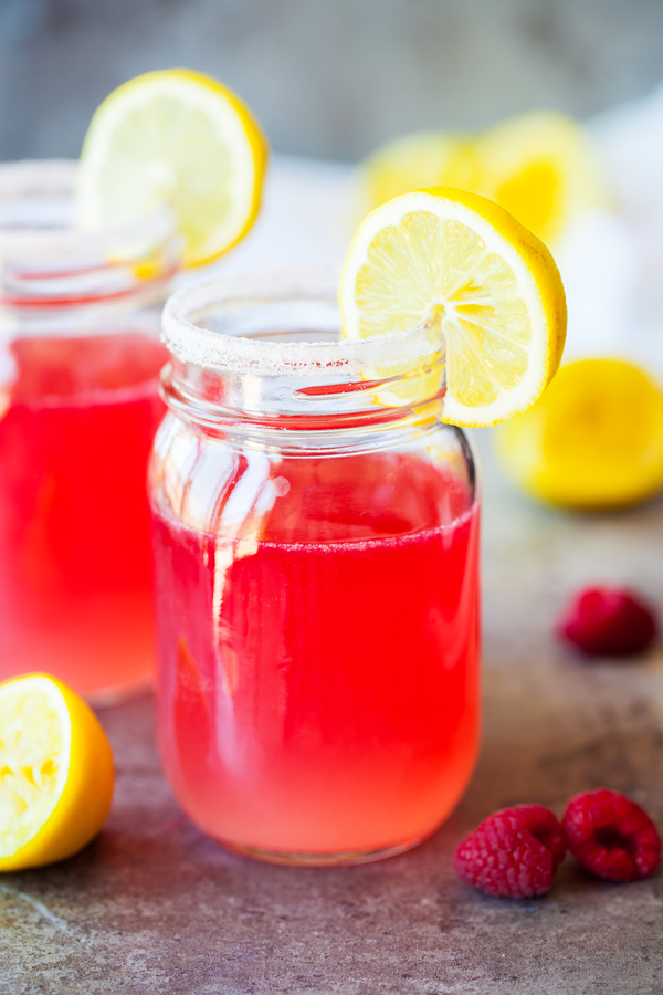 A twist on the traditional Tom Collins, this Raspberry Lemon Vodka Collins is bright, refreshing, and the perfect summer drink.