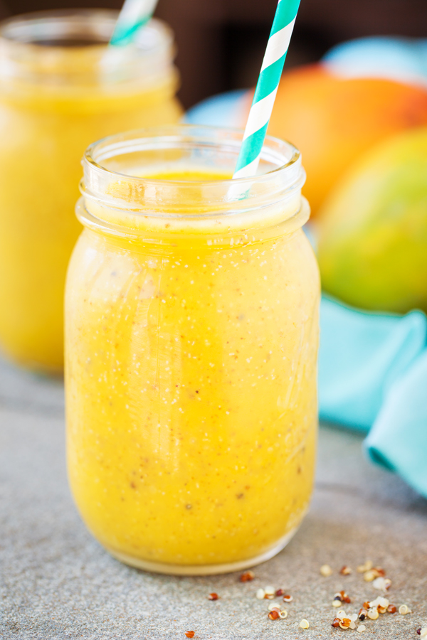 Mango Quinoa Smoothie in mason jar with straw. 