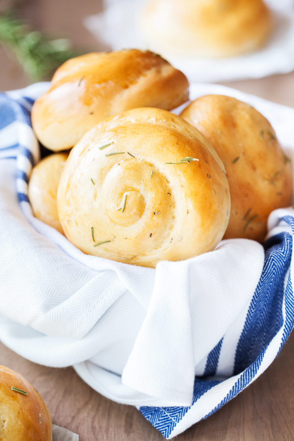 Rosemary Dinner Rolls in a bread basket. 