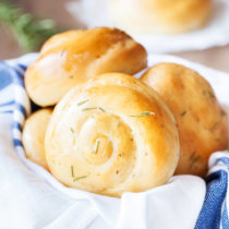 Rosemary Dinner Rolls use fresh rosemary in an easy to handle dough for an incredibly fragrant and beautiful dinner roll.