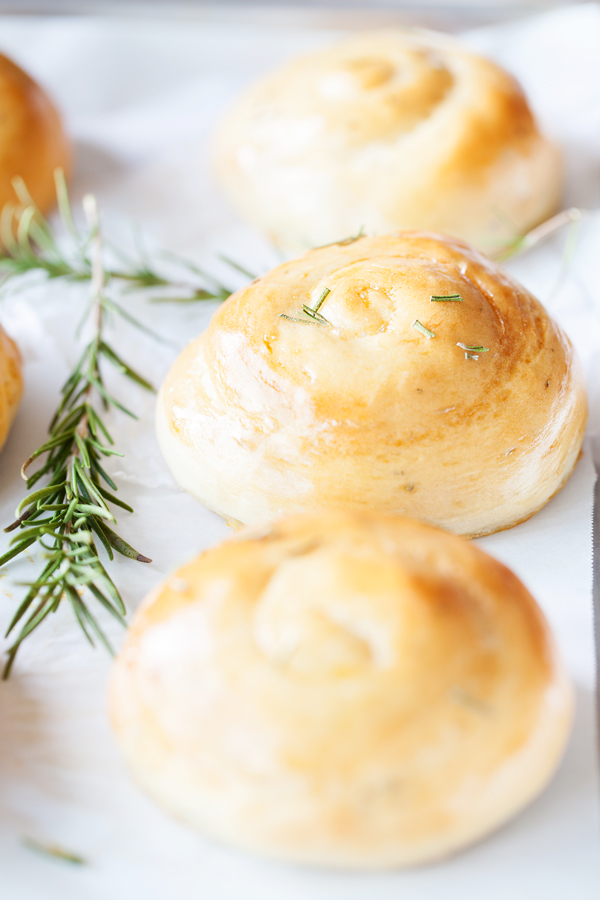 Rosemary Dinner Rolls on parchment paper. 