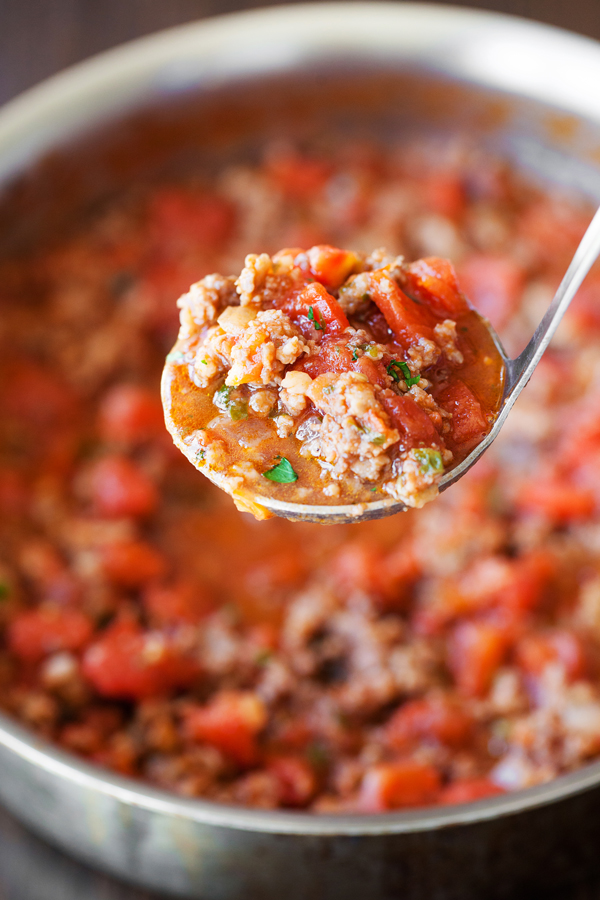 Italian Sausage Tomato Pasta Sauce in a ladle. 