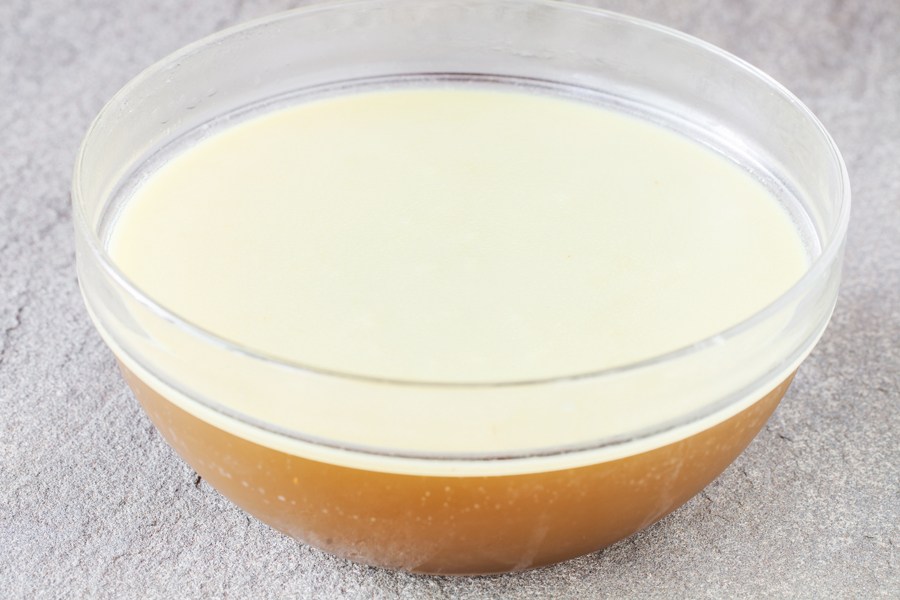 Bowl of homemade chicken stock. 