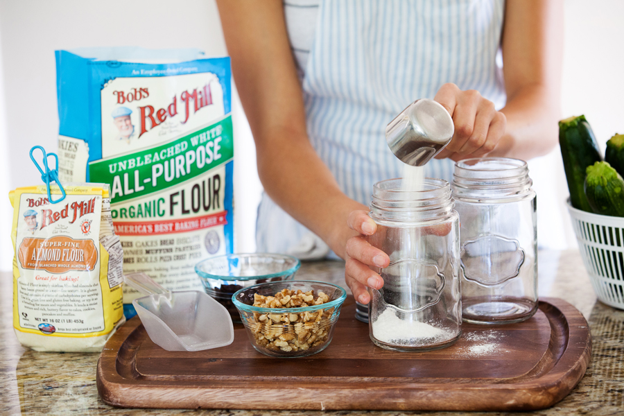 Filling jars with zucchini bread mix. 