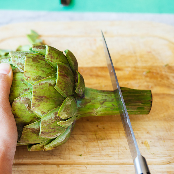 Trimming of an artichoke stem.