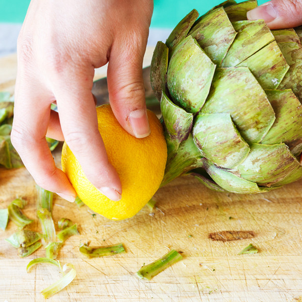 Rubbing of a lemon on an artichoke stem. 