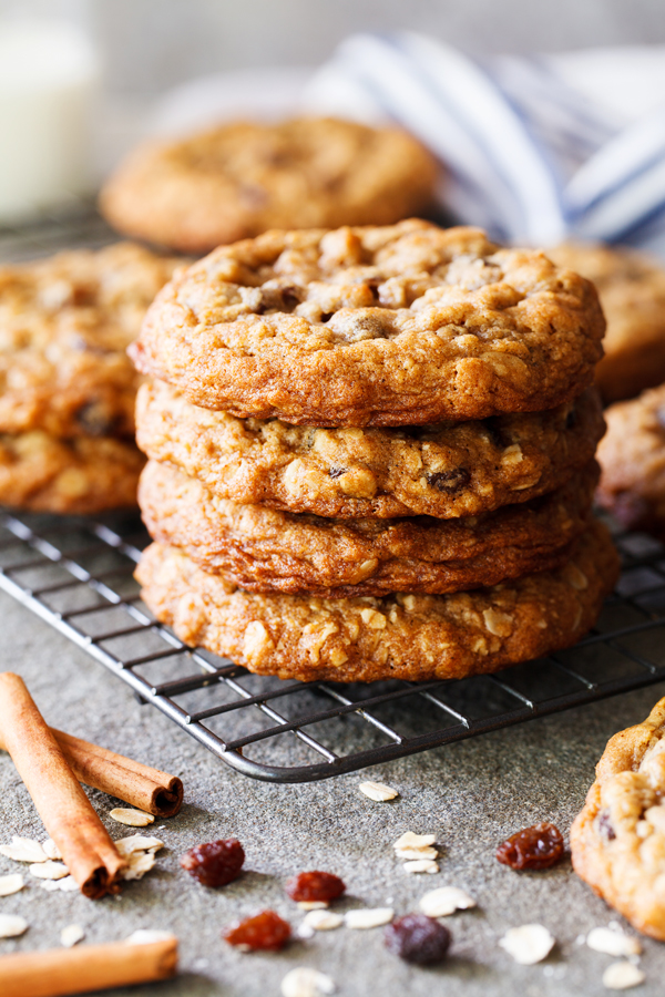 Stack of thick and chewy oatmeal and raisin cookies.