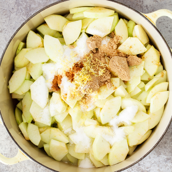 Preparation step for classic apple pie - pie filling in pot