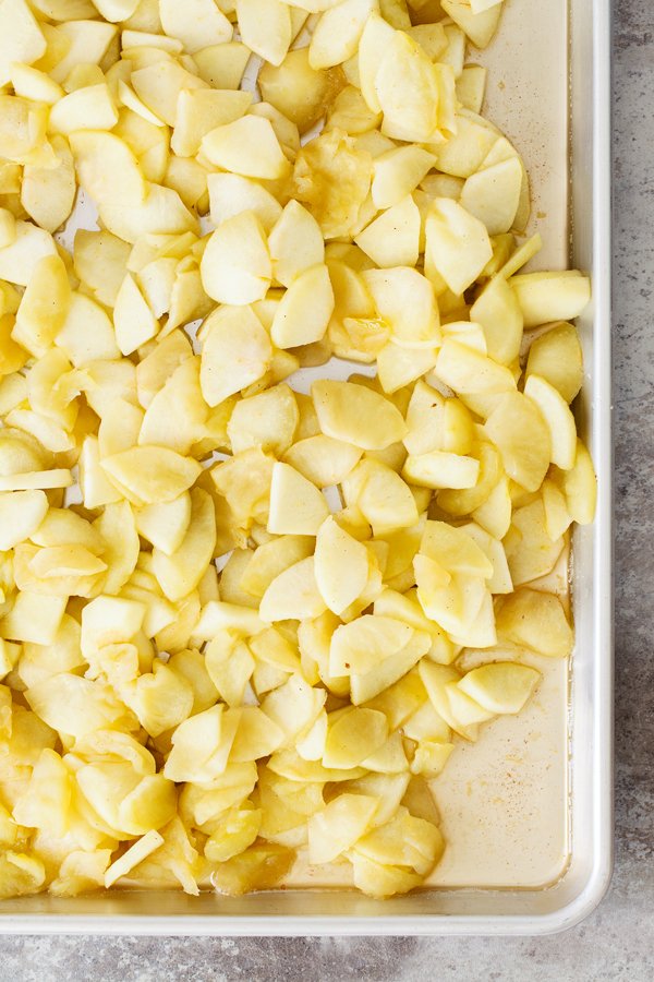 Preparation step for classic apple pie - pie filling cooling on baking sheet