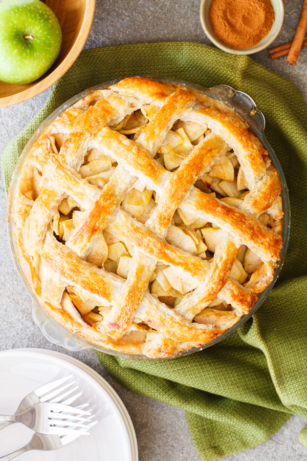 Flat lay of whole classic apple pie.