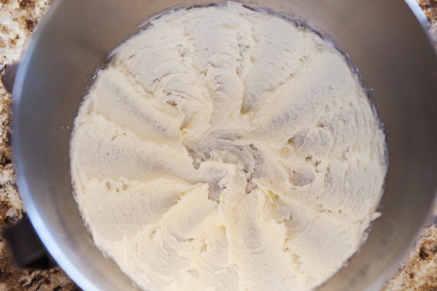 Preparation step for snickerdoodle cookies - butter creamed with sugar in mixing bowl