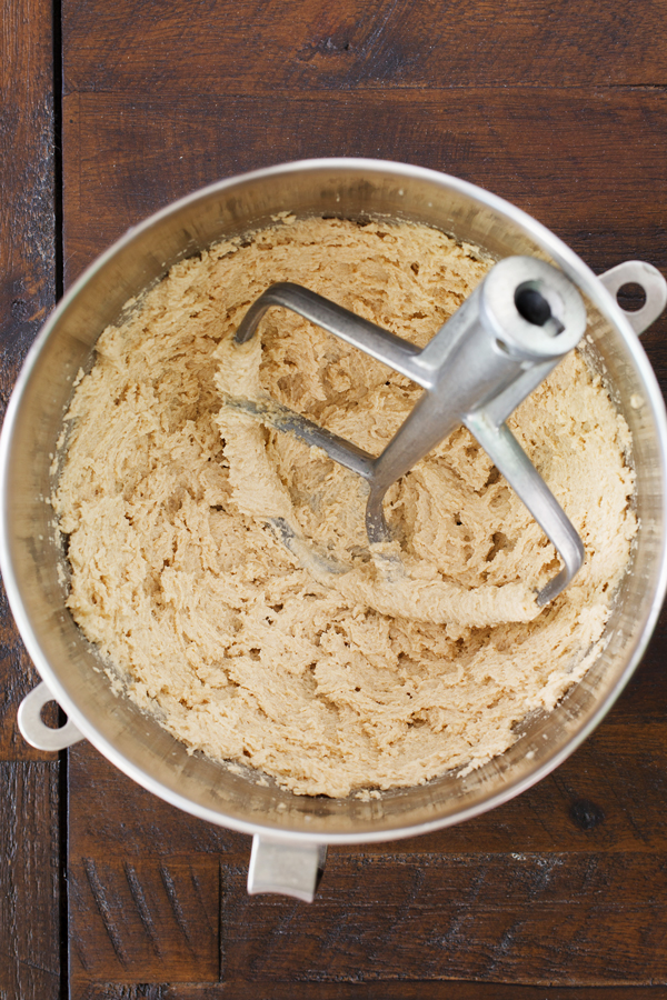 Preparation step for healthier banana bread - butter creamed with brown sugar in bowl