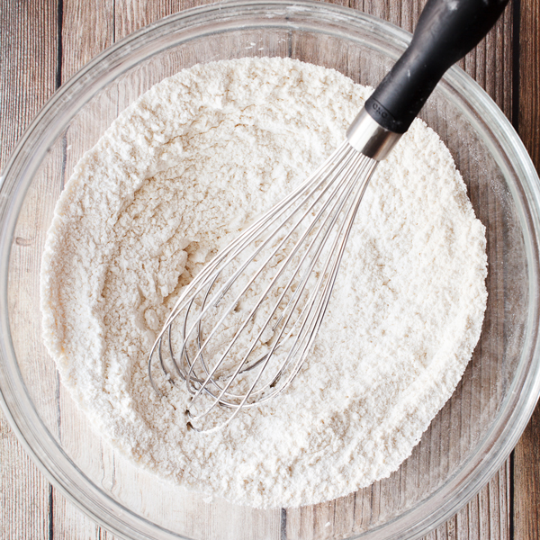 Preparation step for Andes Mint Chip Cookies - dry ingredients with whisk in mixing bowl