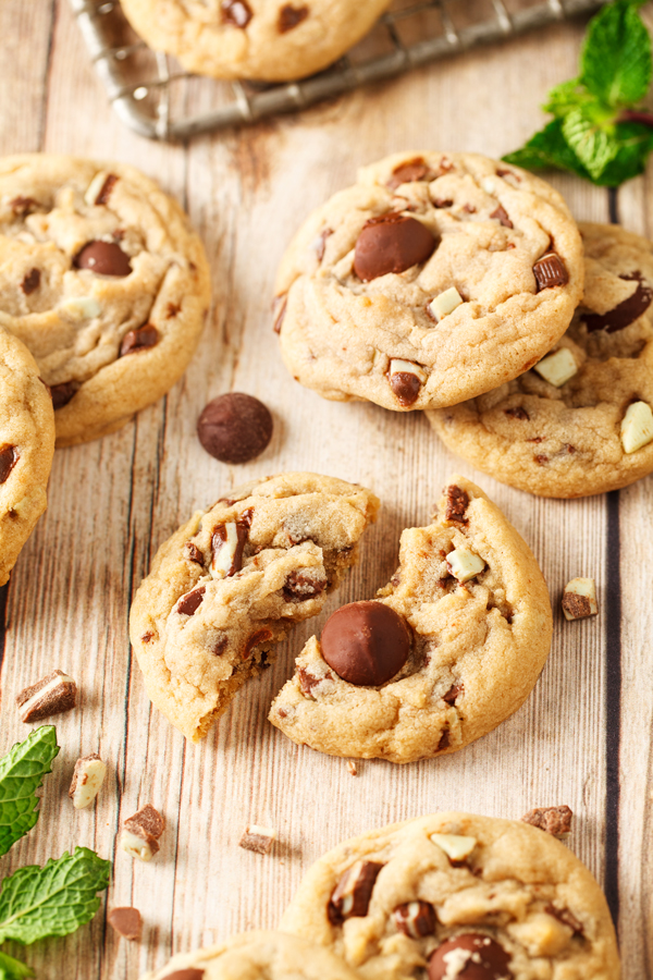 Andes Mint Chip Cookies on wooden board.