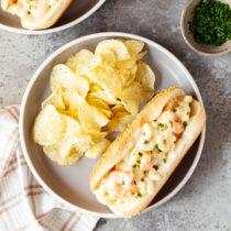 Plated shrimp macaroni and cheese rolls.